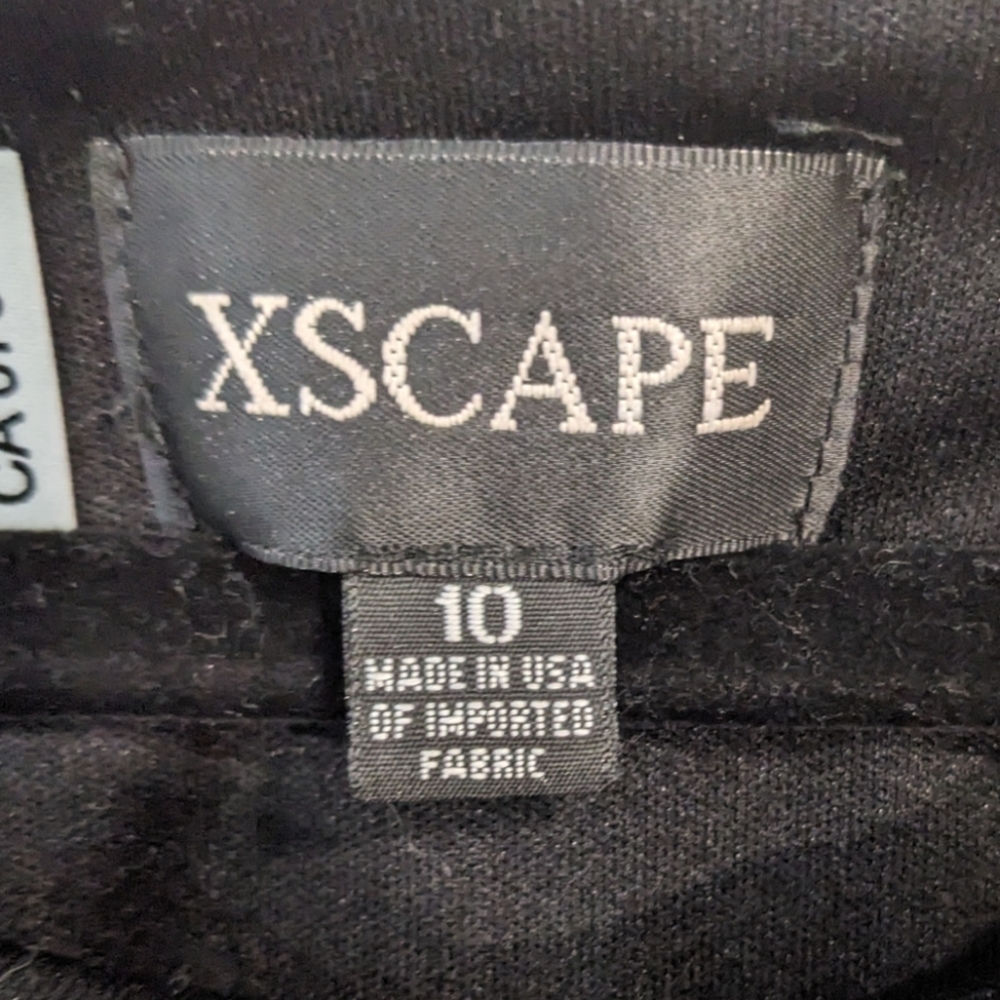 Xscape black formal dress size 10, has a sheet cape attached to neckline. - Picture 9 of 10